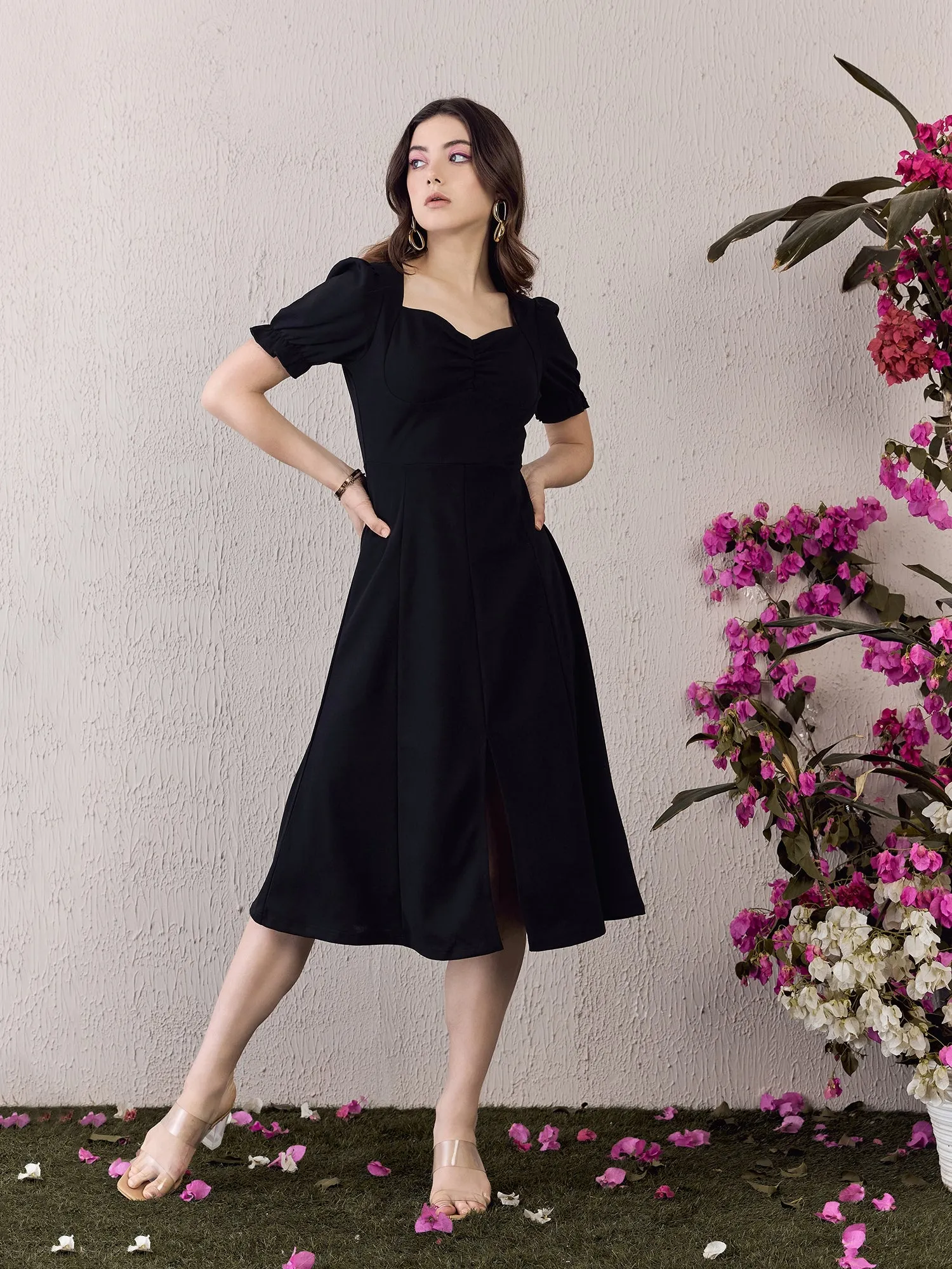 Berrylush Women Solid Black Sweetheart Neck Puff Sleeves Front-Slit Straight Hem Pleated Midi Dress