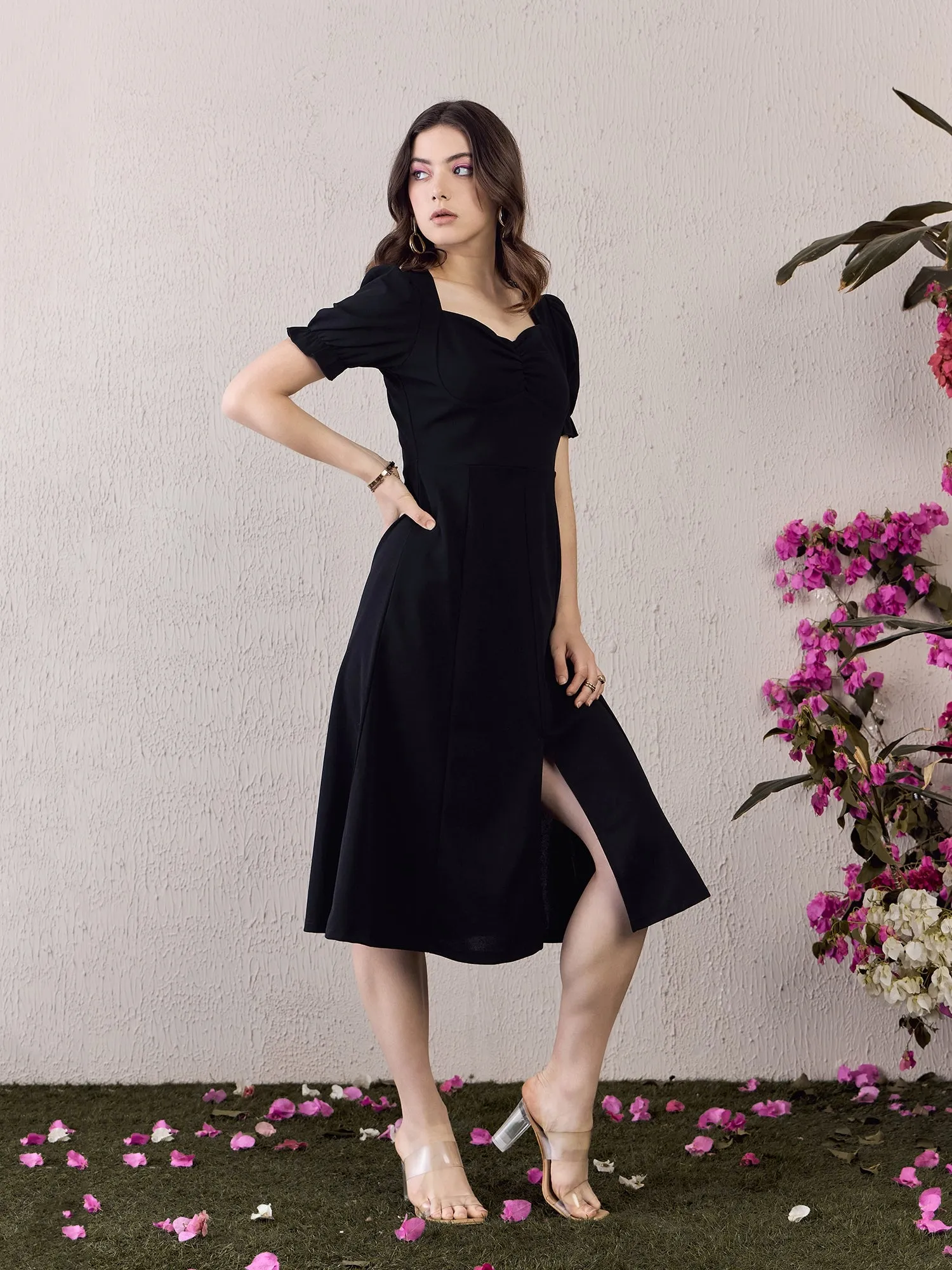 Berrylush Women Solid Black Sweetheart Neck Puff Sleeves Front-Slit Straight Hem Pleated Midi Dress